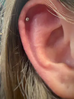 Helix piercing by Briana