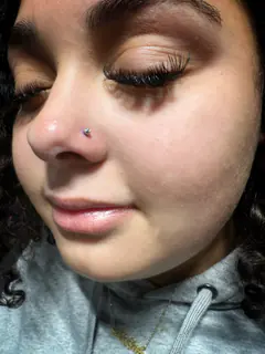 Nostril piercing by Briana