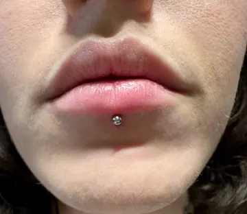 Labret piercing by Briana
