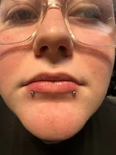 Snakebites piercing by Briana