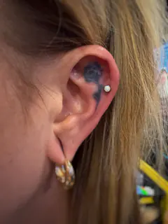 Helix piercing by Briana