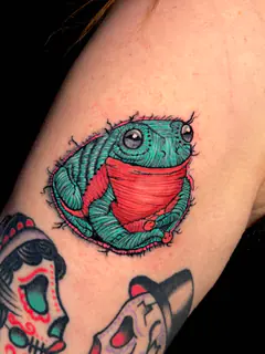 Matching pixel-art Charmander and Bulbasaur tattoos by Dave