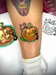 Embroidered patch-style pumpkin tattoo by Dave