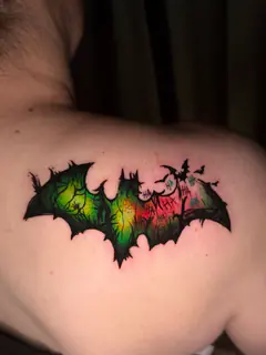 Pixel-art Pokemon character collage tattoo by Dave