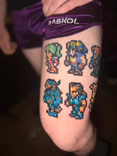 Pixel-art Mario character collage tattoo by Dave