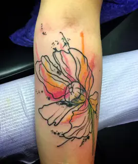 Pastel watercolor unicorn tattoo
