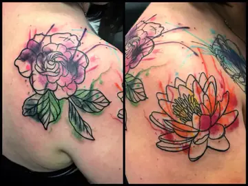 Abstract Xoil-inspired moon and black brushwork tattoo wrapping a shoulder